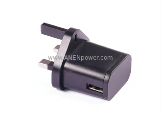 China 6W UK Plug UKCA Certified 5V 1A 1.2A Wall USB Charger 12V Plug-in AC DC Power Adapter supplier